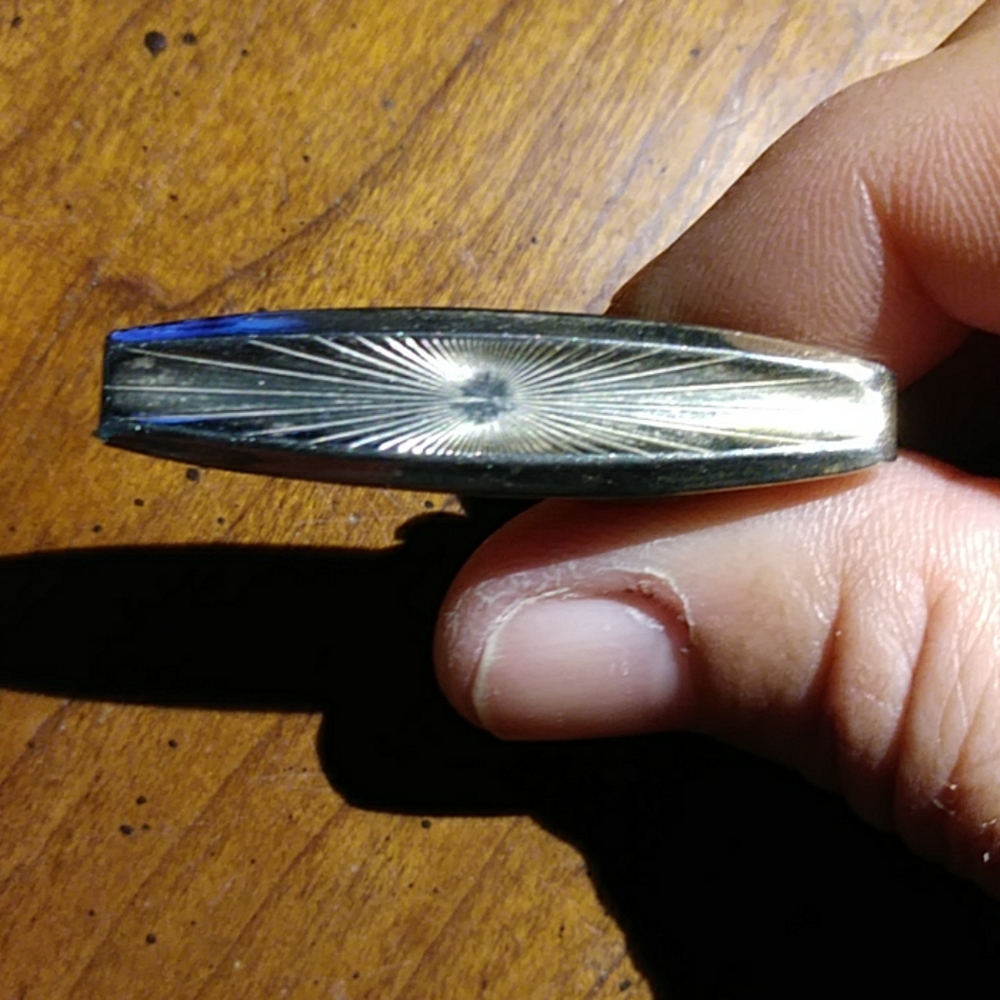 Vintage tie clip lines on front